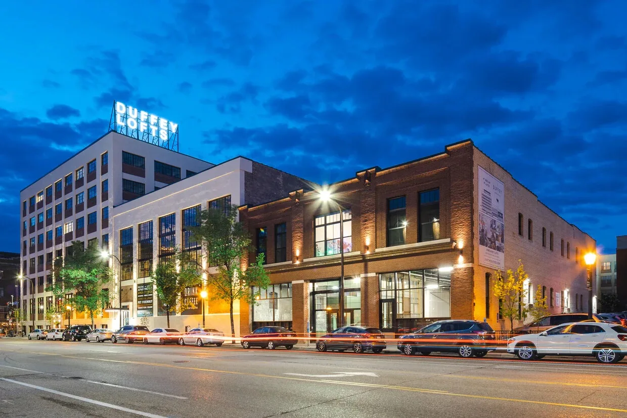 Duffey Lofts, Minneapolis, MN: a multifamily building at dusk